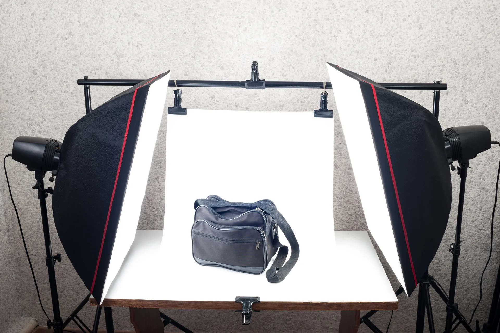 Studio product photography lighting setup with shooting table